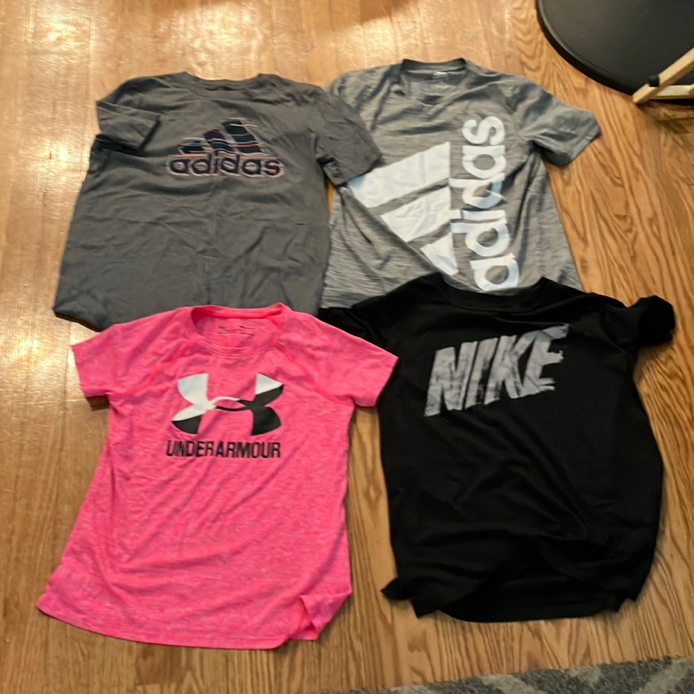 3 adidas shirt and 1 Nike